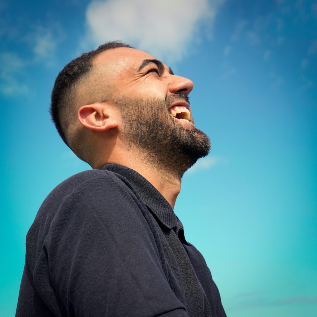 man laughing in sky